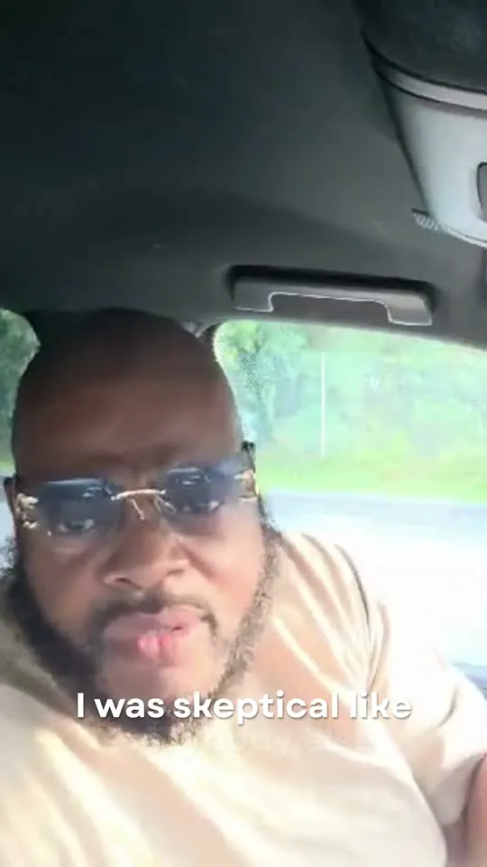 Gary speaking to the camera from the driver's seat of his car.